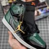 Green Air Jordan 1 Sneakers with a jordan chain attached to Shoe Lace hole