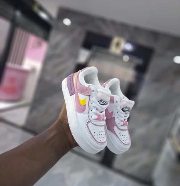 Two Pink and White Kid's Sneakers